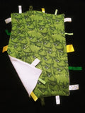 Green Dinosaur Lovey blanket with tags
